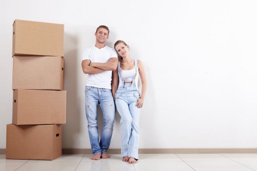 Boxes and household items arranged in a secure Belsizepark storage space
