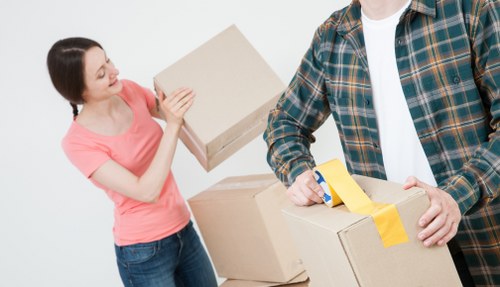 Moving boxes and furniture prepared for removals in Belsizepark