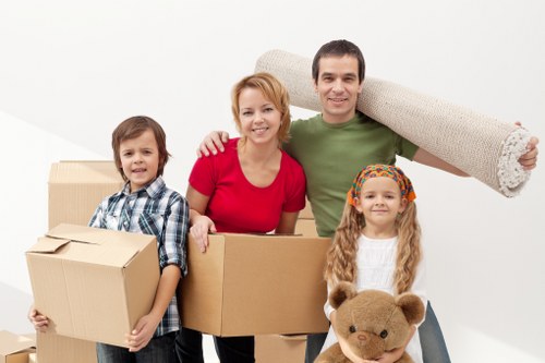 Residents using temporary storage for moving and decluttering in Belsizepark