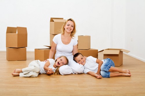 Prepared storage boxes and furniture in a Belsizepark storage setting